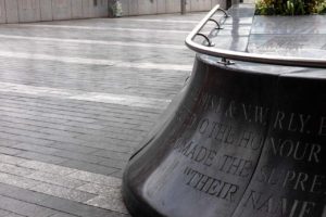 The war memorial by New Street Station in Birmingham, UK, is shown with the handrail installed by Group2u.